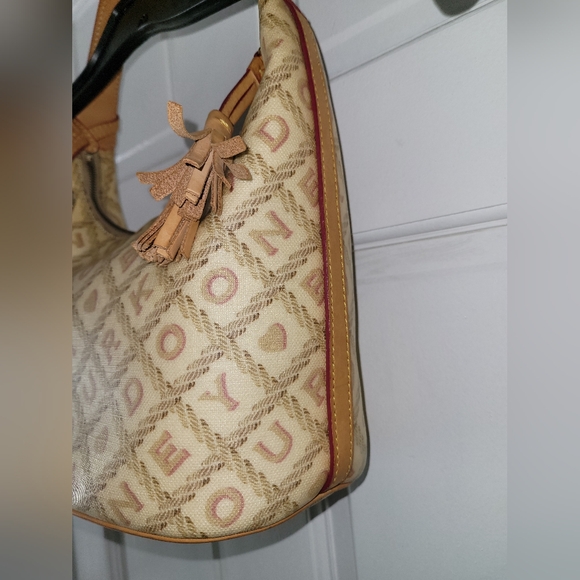 Dooney & Bourke Coated Canvas Signature Logo Charm Bucket Bag, Ivory - Picture 2 of 12